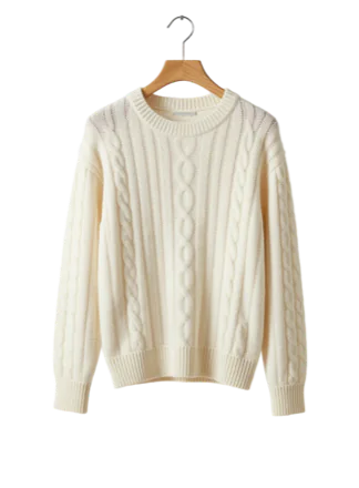 Cream cable-knit sweater on a wooden hanger
